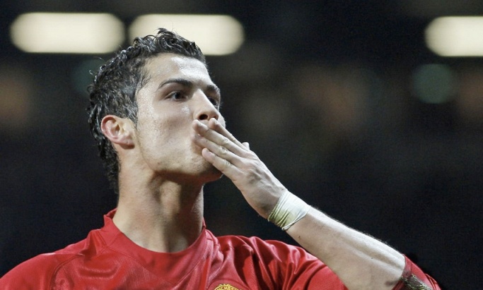 Ronaldo spots a mirror in the crowd...